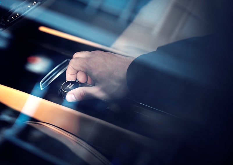 The driver of a 2023 Lincoln Corsair® SUV is shown adjusting the drive mode. | J.C. Lewis Lincoln in Savannah GA