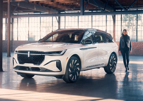 A person approaches a 2024 Lincoln Nautilus® SUV. | J.C. Lewis Lincoln in Savannah GA