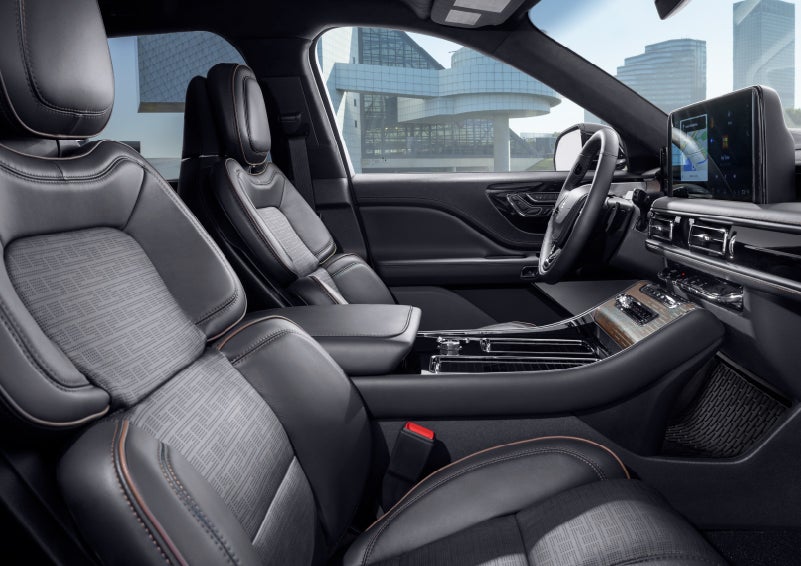 The interior of the 2025 Lincoln Aviator® SUV is shown with sleek black accents. | J.C. Lewis Lincoln in Savannah GA