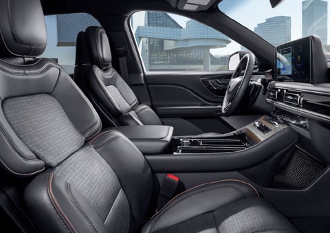 The interior of the 2025 Lincoln Aviator® SUV is shown with sleek black accents. | J.C. Lewis Lincoln in Savannah GA