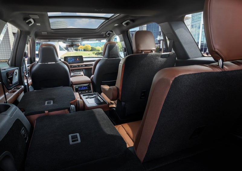 The interior of the 2025 Lincoln Aviator® SUV is shown with two seats folded down for added space. | J.C. Lewis Lincoln in Savannah GA
