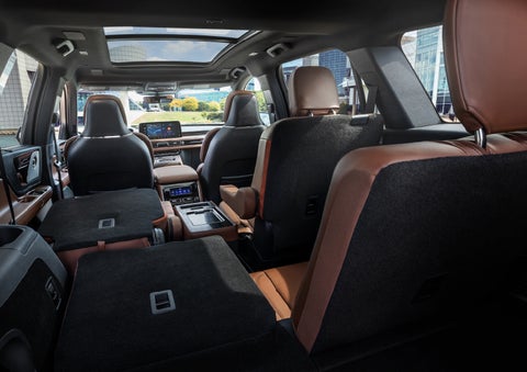 The interior of the 2025 Lincoln Aviator® SUV is shown with two seats folded down for added space. | J.C. Lewis Lincoln in Savannah GA