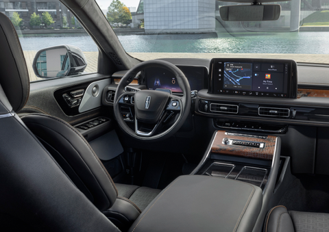 The interior of the 2025 Lincoln Aviator® SUV is shown parked with a view of a harbor through the windshield. | J.C. Lewis Lincoln in Savannah GA