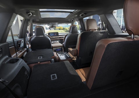 One side of the PowerFold® third-row seat and a second-row seat are folded forward in the 2026 Lincoln Aviator® SUV. | J.C. Lewis Lincoln in Savannah GA