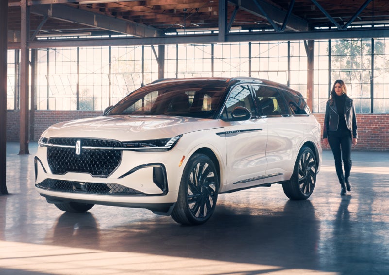 A person approaches a 2026 Lincoln Nautilus® SUV. | J.C. Lewis Lincoln in Savannah GA