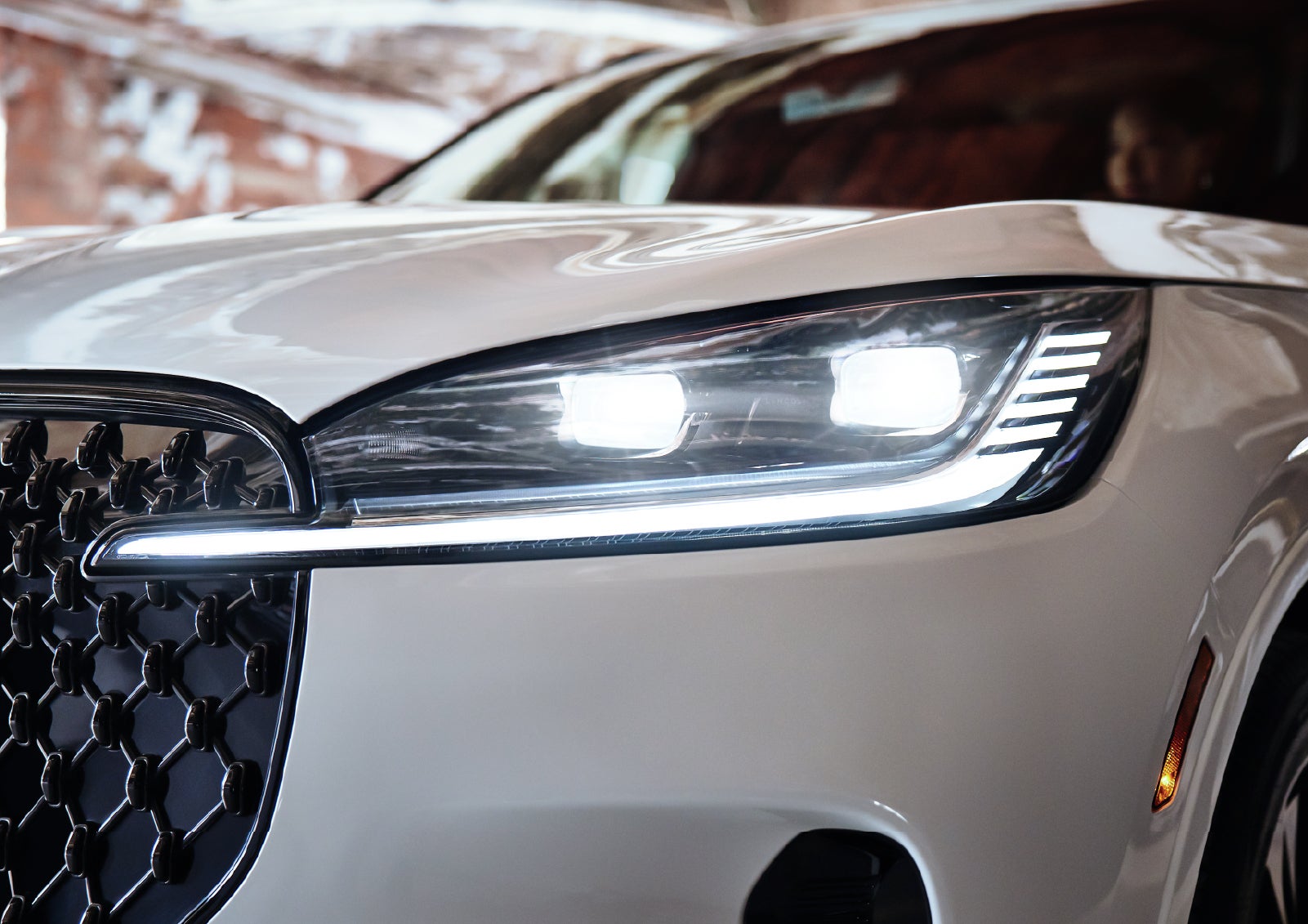 A close-up of a headlamp on the 2027 Lincoln Aviator® SUV is shown. | J.C. Lewis Lincoln in Savannah GA