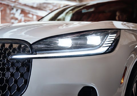 A close-up of a headlamp on the 2027 Lincoln Aviator® SUV is shown. | J.C. Lewis Lincoln in Savannah GA