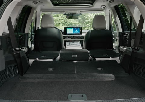 A rear to front view of the interior of a 2027 Lincoln Aviator® Black Label™ SUV shows the third and second rows folded flat | J.C. Lewis Lincoln in Savannah GA