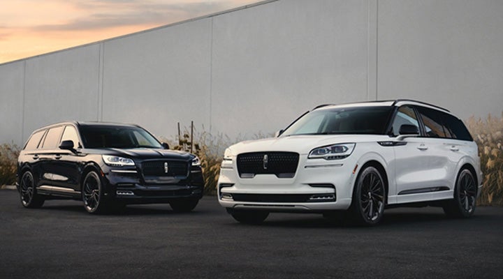 Two Lincoln Aviator® models are shown with the available Jet Appearance Package