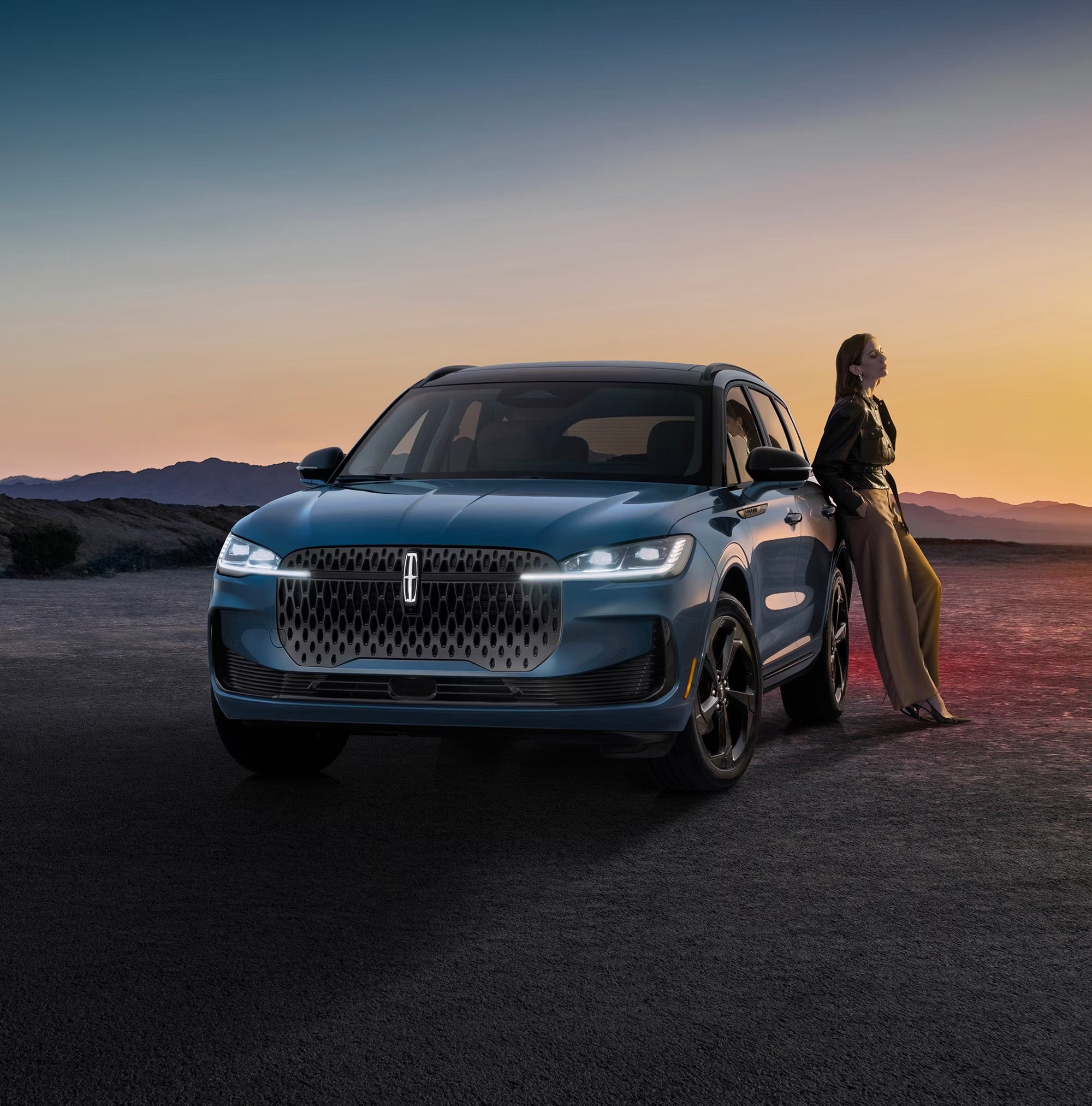 A woman lounging against a lincoln corsair 2027 at sunset